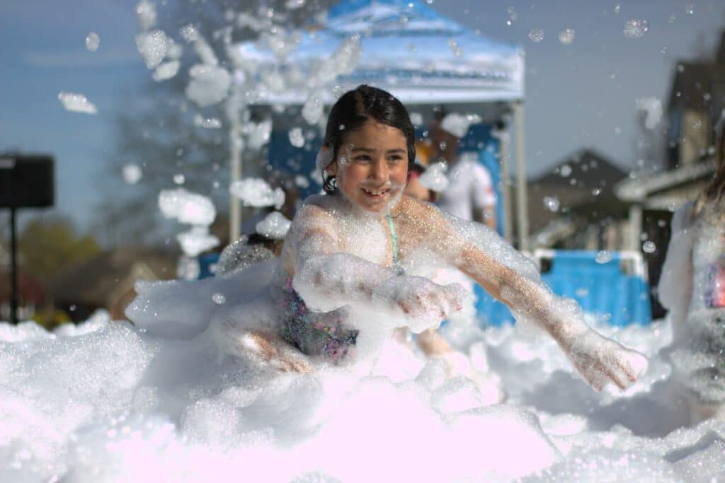 Girl having fun at a foam party event