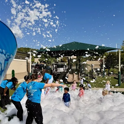 Kids playing in foam at a Hilltop foam party