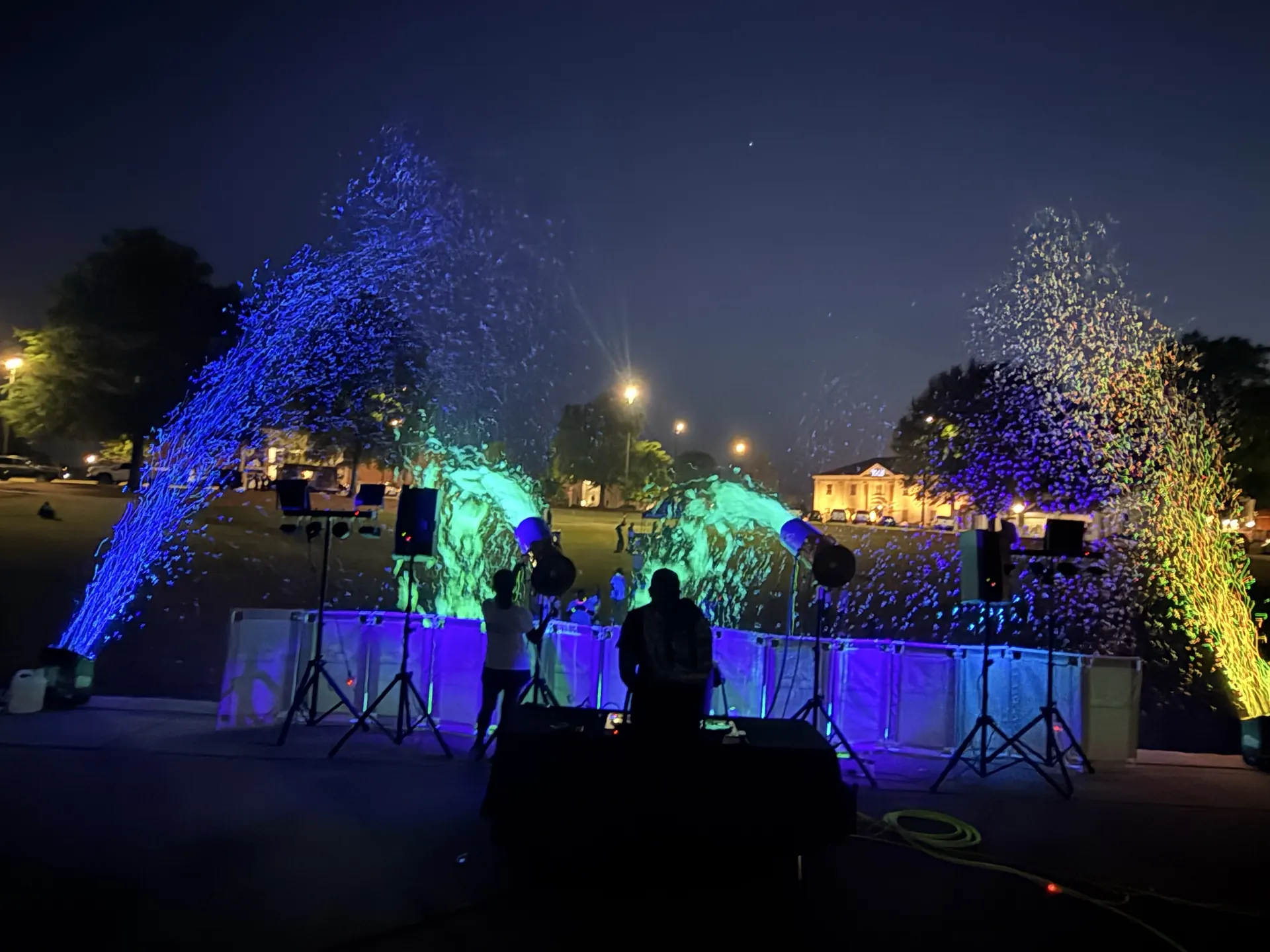 Hilltop glow foam stage with lights and foam cannons set up at dusk in Athens, Alabama