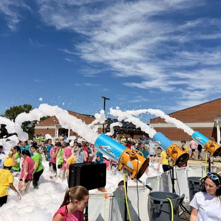 Three foam cannons running at a Liberty Creek Middle School foam party