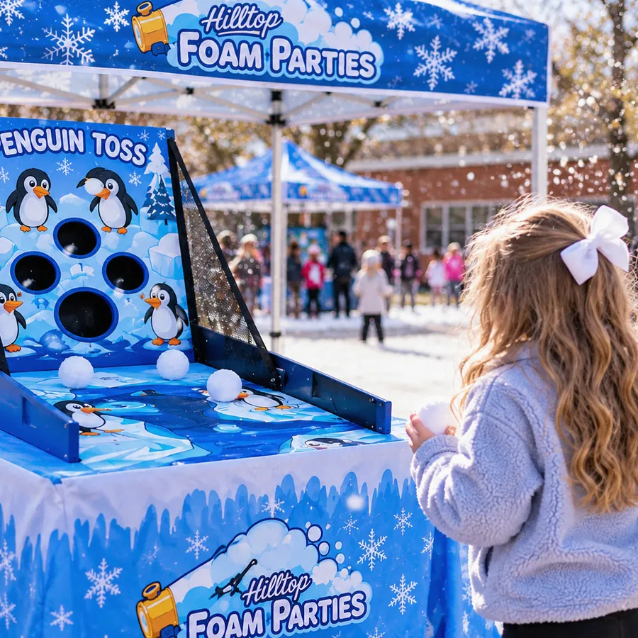 Girl with a snowball at the Penguin Toss game at a Hilltop snow party