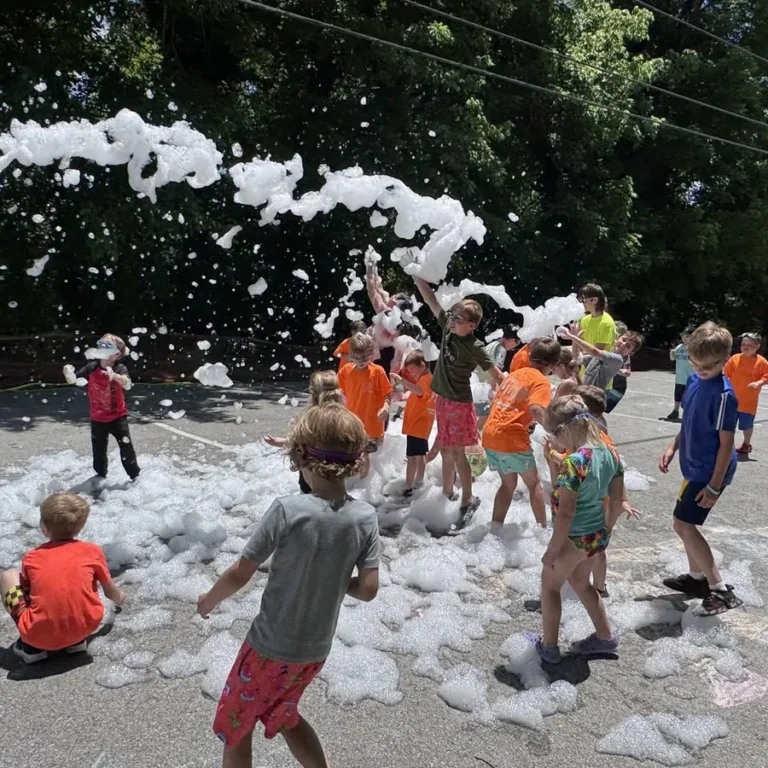 Kids playing in foam at a Bushido Karate Center summer kickoff