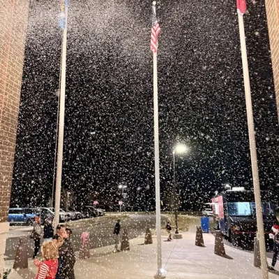 Falling snow at an Amanda North Elementary winter event